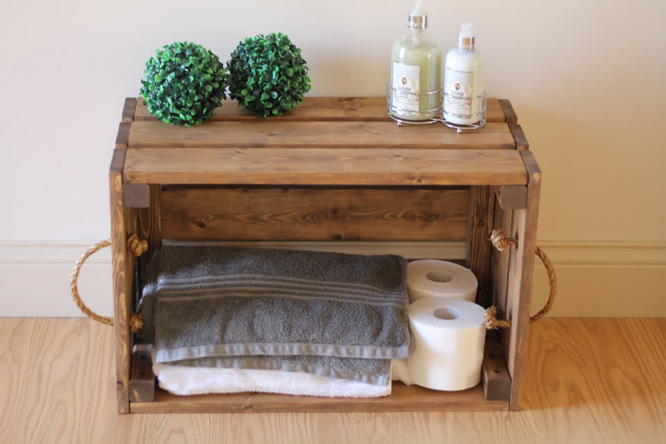 How to use furniture pieces in a bathroom for more storage